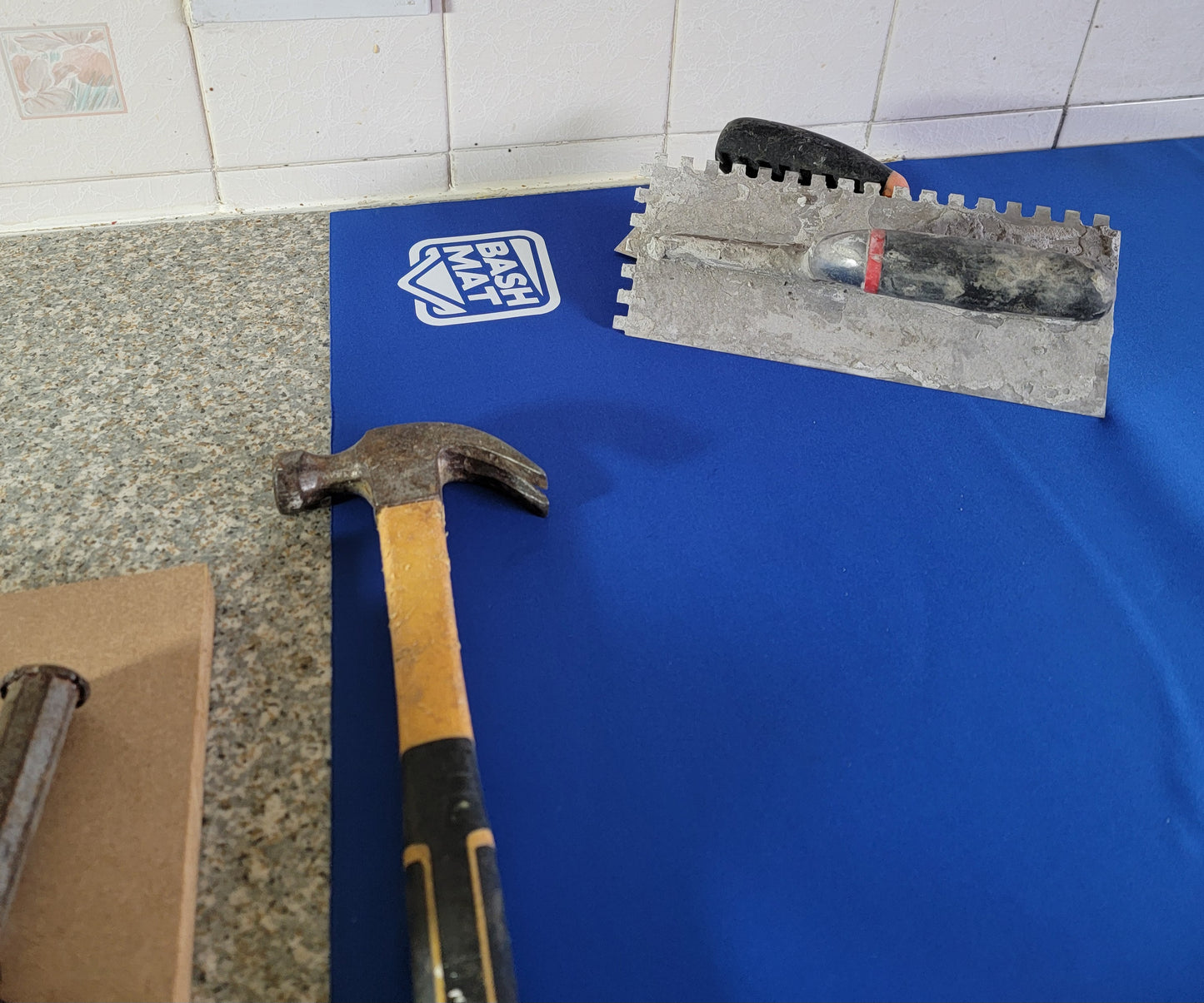 Bash Mat is the perfect solution for the professional who needs to protect a high end finished area from drops, spills and scratches. The Bash Mat gives a large working area of protection and will works as a knee pad or tool pad. Neoprene runners are waterproof but also wick moisture from shoes to stop it transferring into the property. They can be hung and dried over night ready for repeat usage again and again.