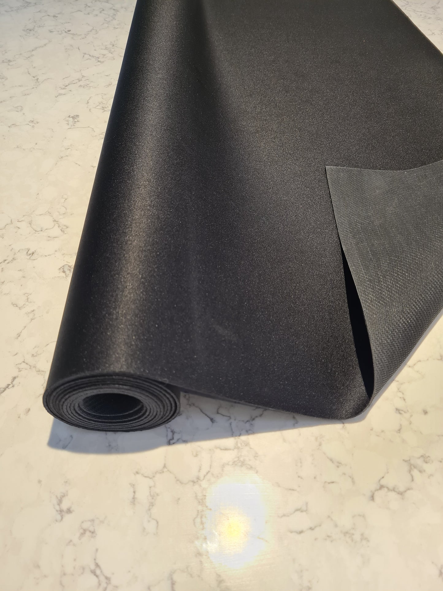 A neoprene rubber matting that is waterproof and will not slip. Removals floor runners and used by all professionals to protect highly finished floors while working. They are made of a rubber neoprene mix that will dry quickly and can be used again and again.