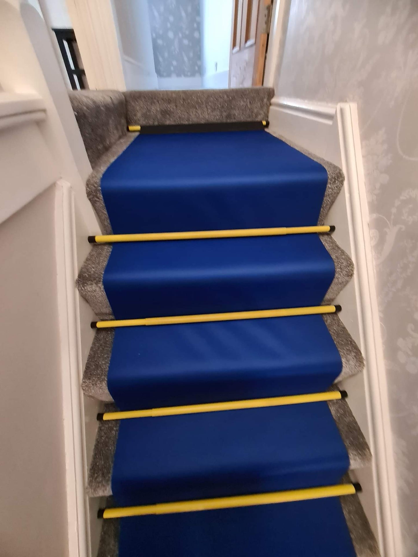 stair rods Neoprene floor runners are the perfect solution to high traffic areas where protection is needed from foot traffic, water and dirt. neoprene floor runners can be used on all types of flooring from carpet, tiles, wood and stone. Neoprene floor runners are waterproof and can be cut from 1m to 30m. Neoprene floor runners are waterproof but also wick moisture from shoes to stop it transferring into the property. they can be hung and dried over night ready for repeat usage.